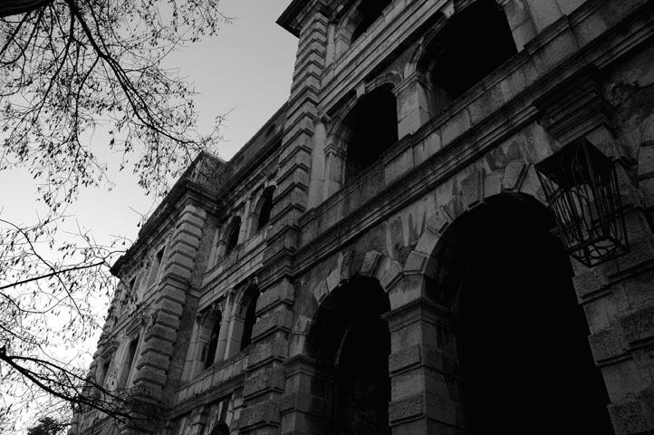 a black and white po of an old building