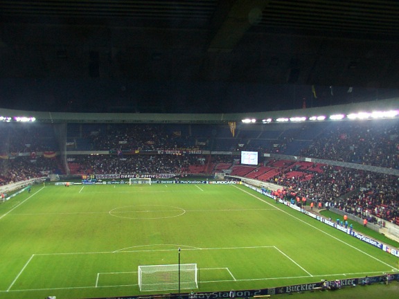 an arena full of people watching a soccer match