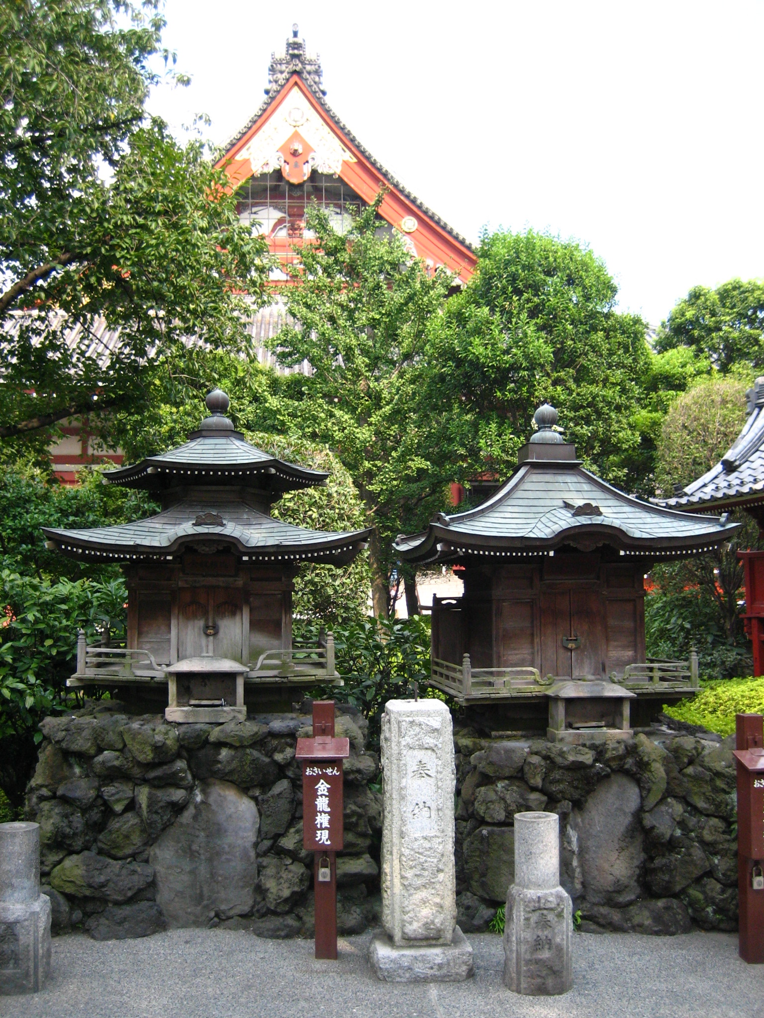 several asian style stone and wood buildings