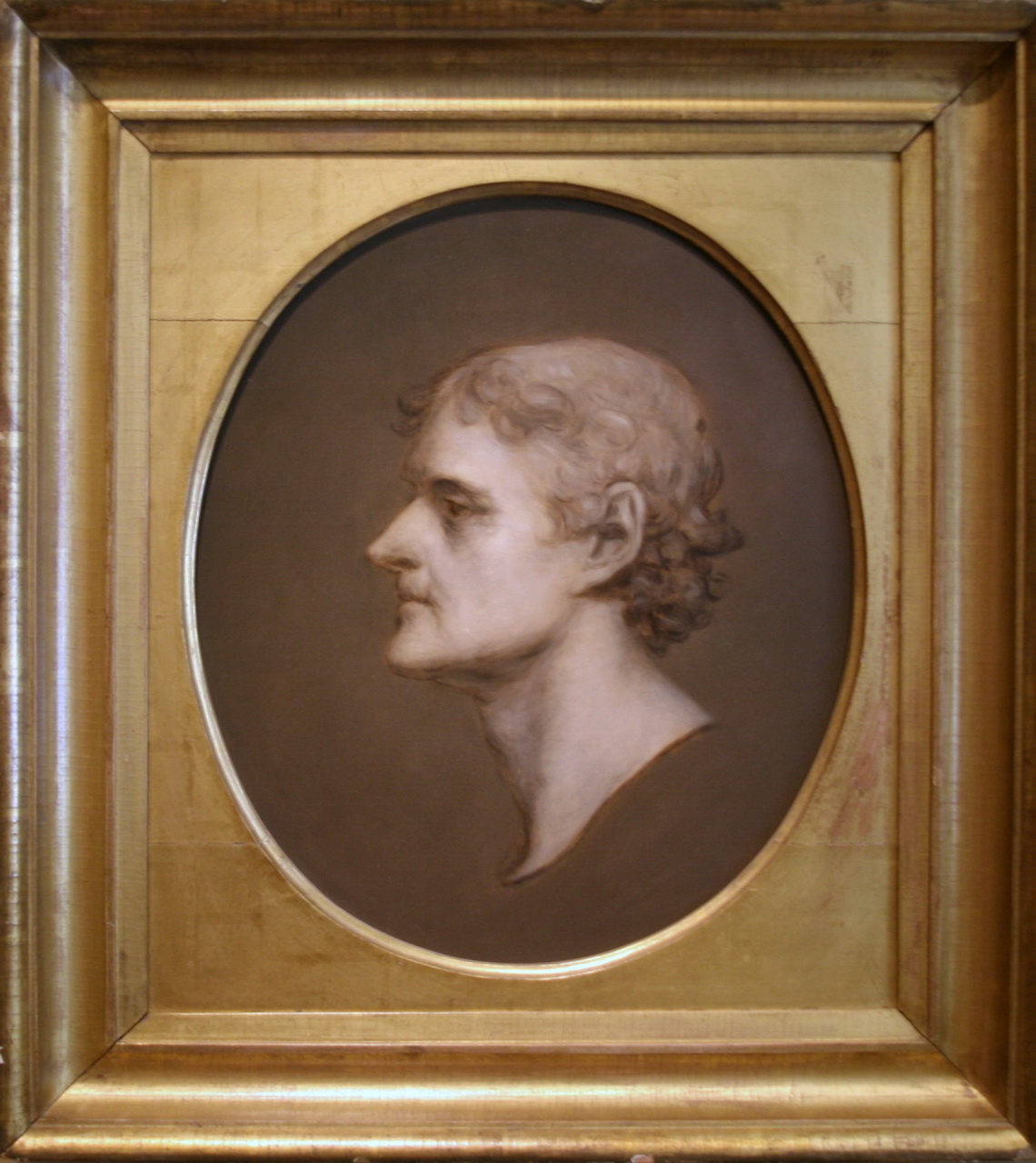 a portrait of a man in a frame