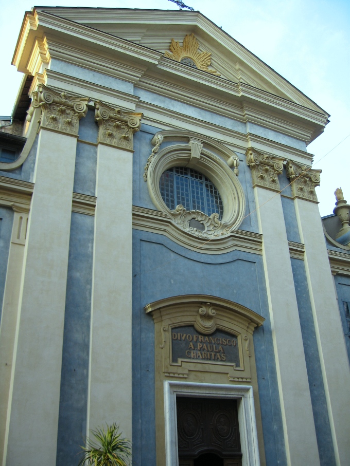 the front entrance to the church is blue and white