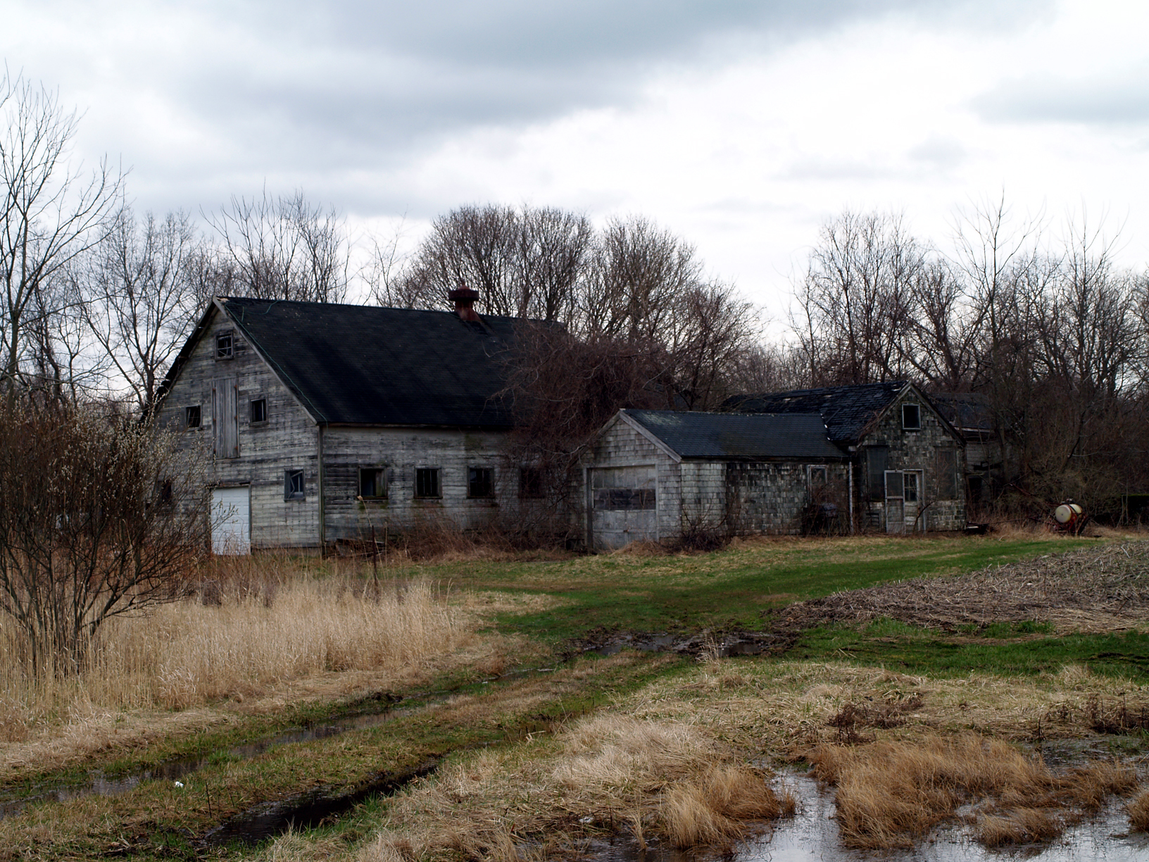 an old abandoned house in a rural area