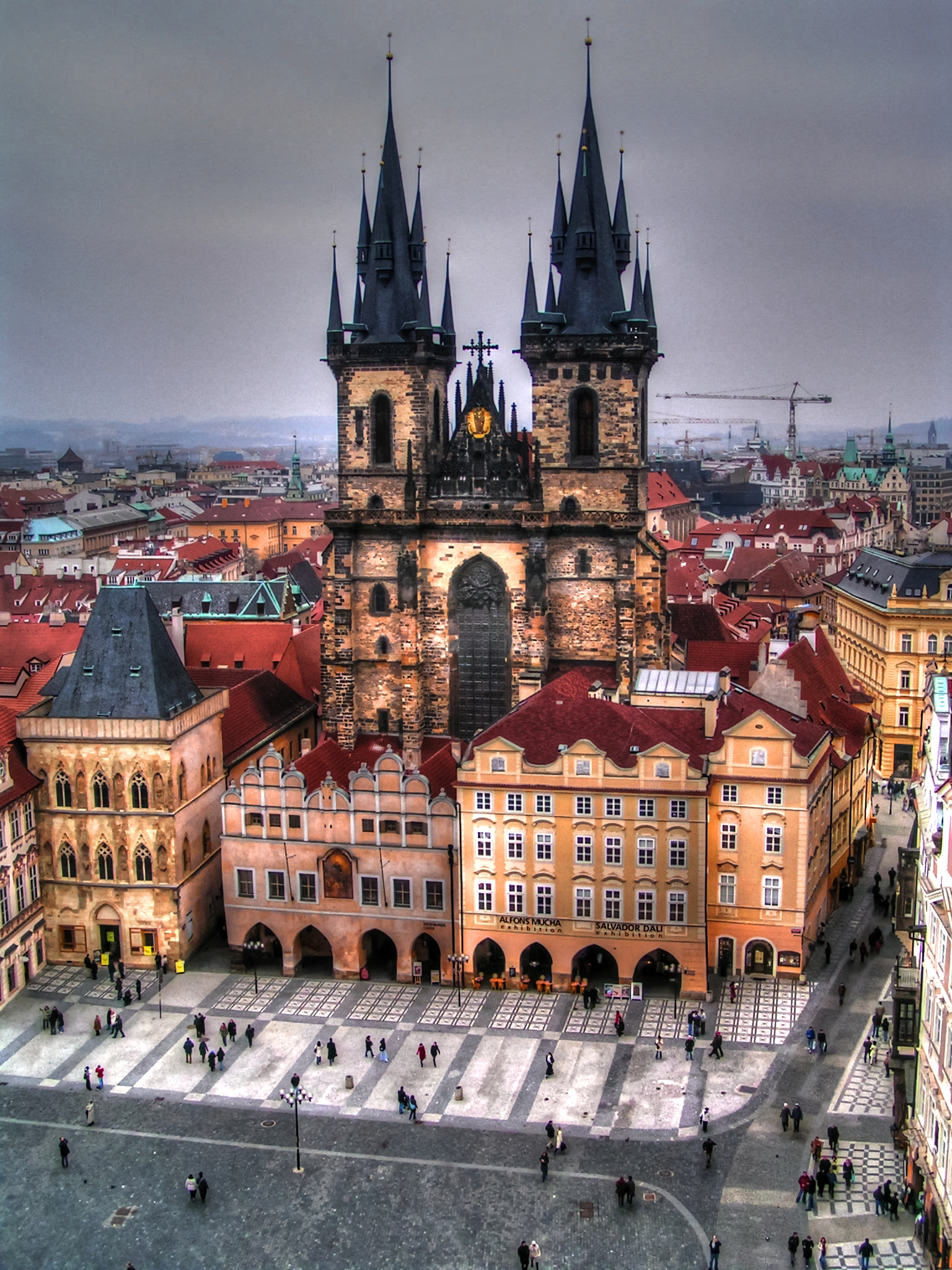 a large old church with many spires sits in the city