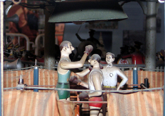 statues of men playing basketball in an amut area