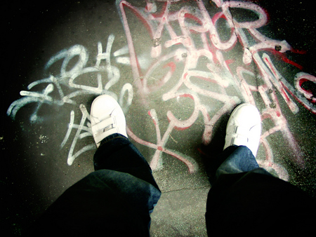 a person standing on top of a skate board