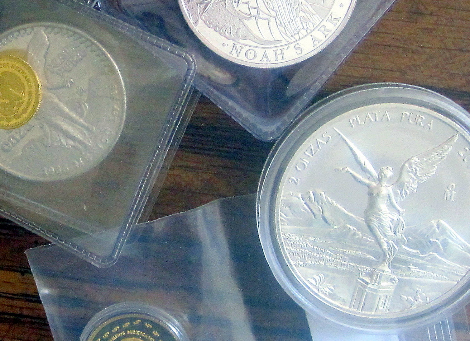 some very pretty looking coins on a table