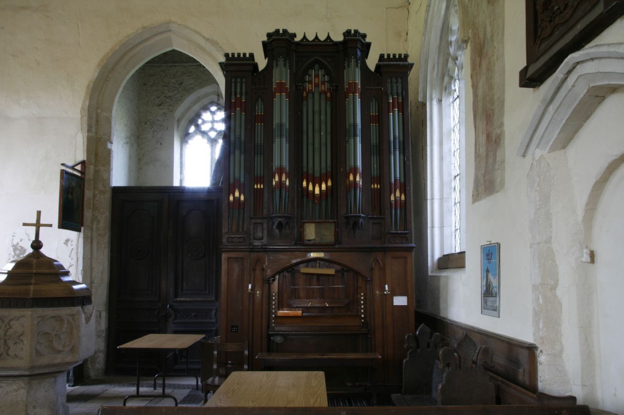 a big old church has an organ in it