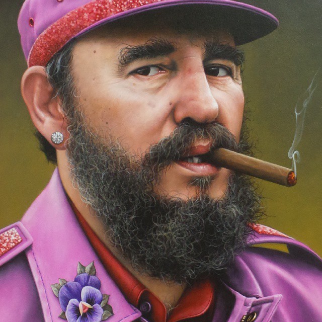 a man with beard in uniform holding a cigarette