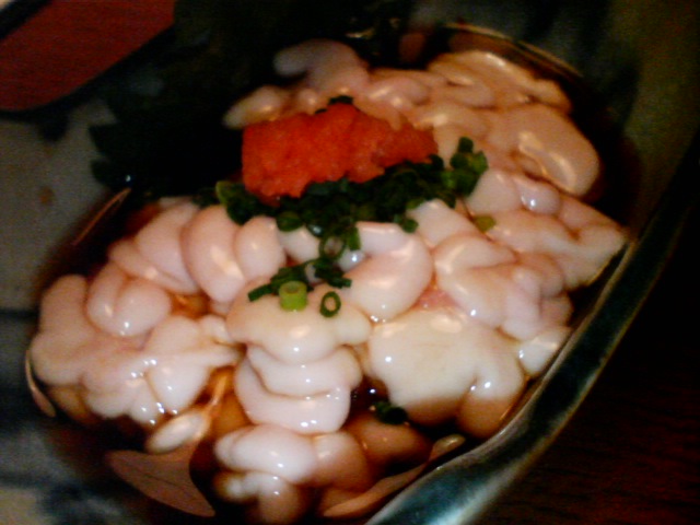 a dish is shown with shrimp in sauce