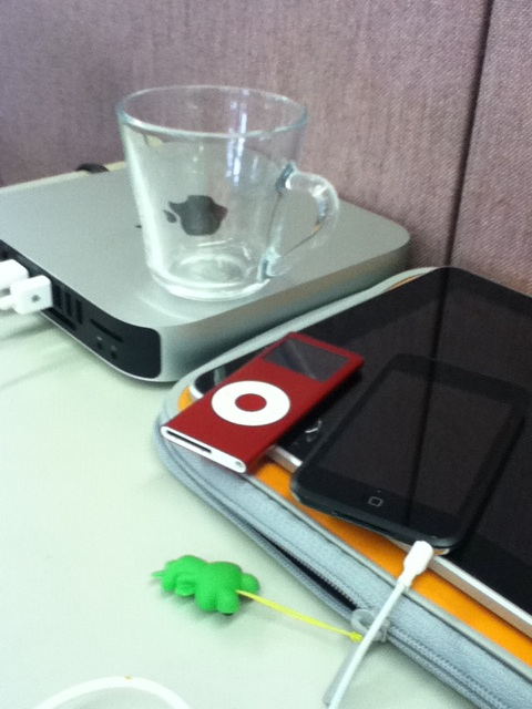 an image of an ipod on top of a book