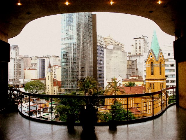 the view from a balcony overlooking the city