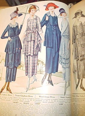 the pages of the book show different styles of dresses