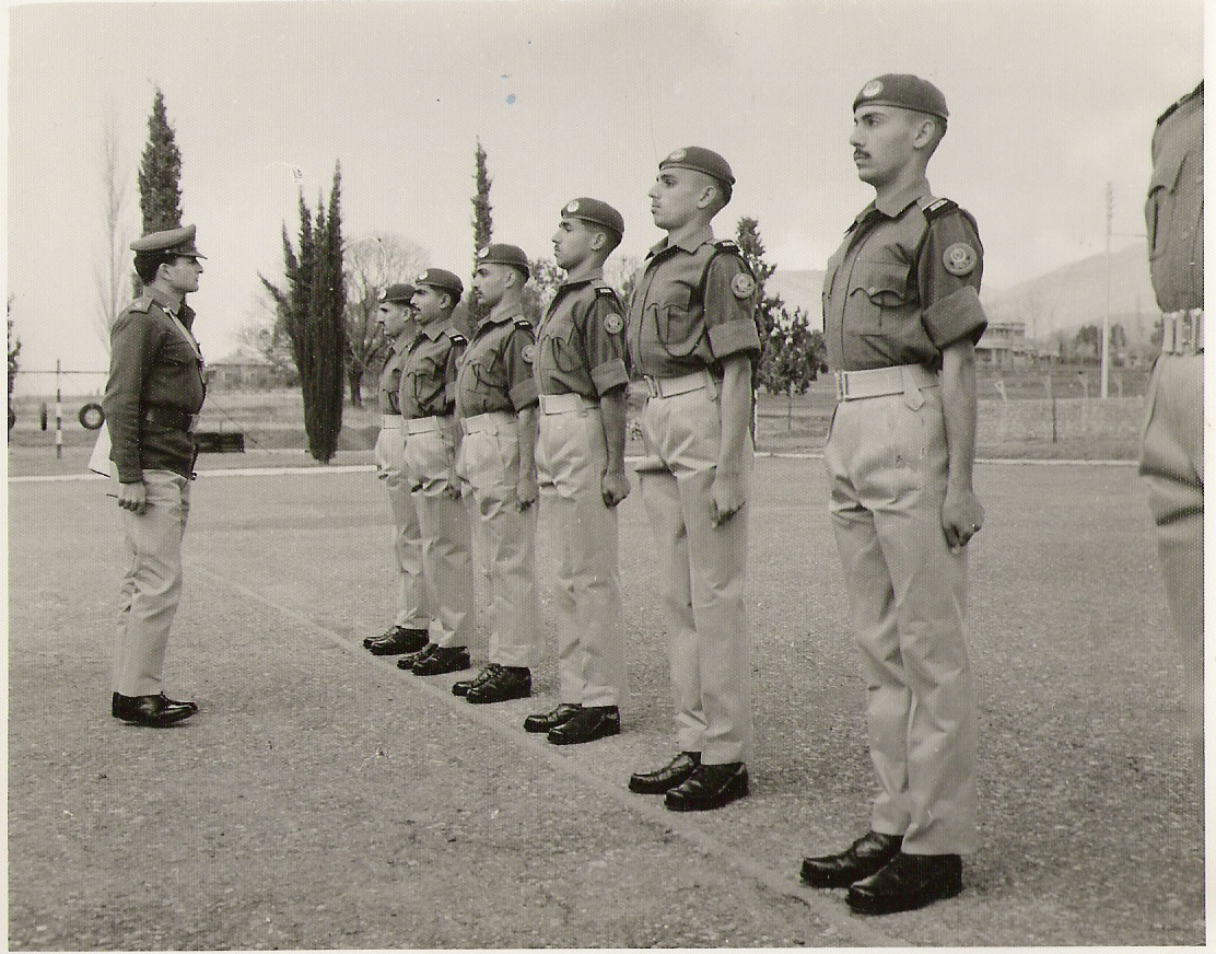 a group of uniformed men standing next to each other