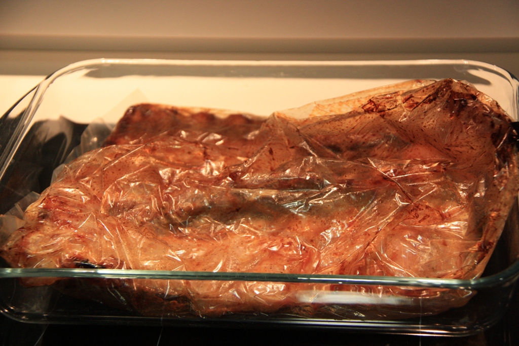 the meat in the plastic is ready to be cooked