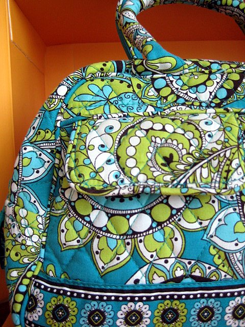 a large purse with an interesting design on it