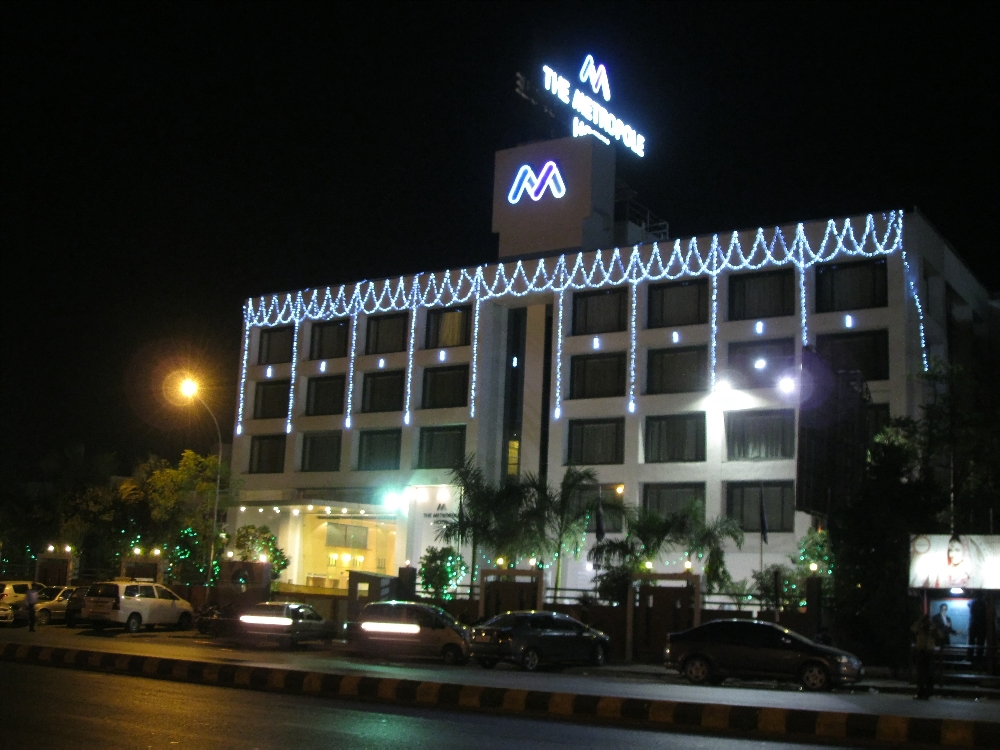 the lights decorate a large white building