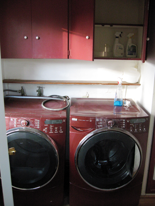 an image of a laundry room setting with washers