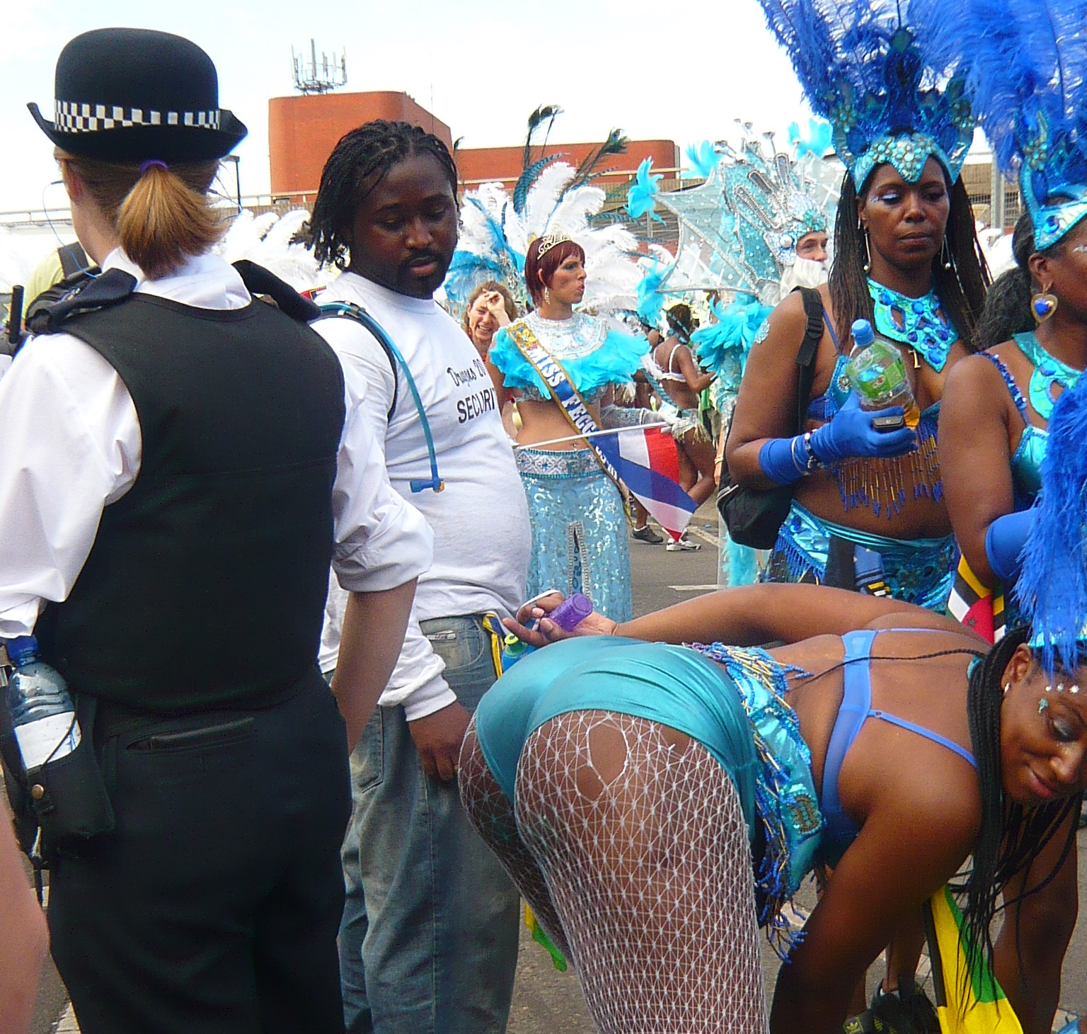 an image of women dressed in costumes during a parade