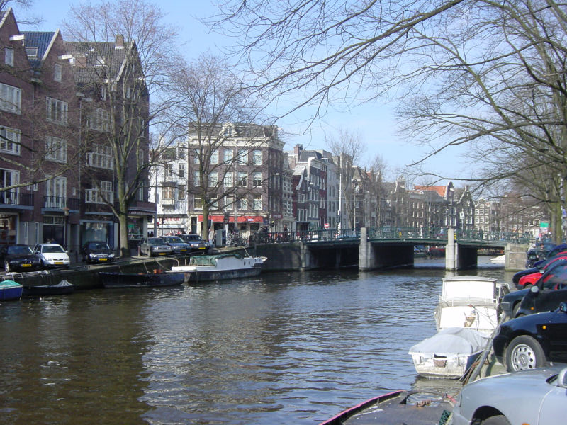 a river with boats in it running through it