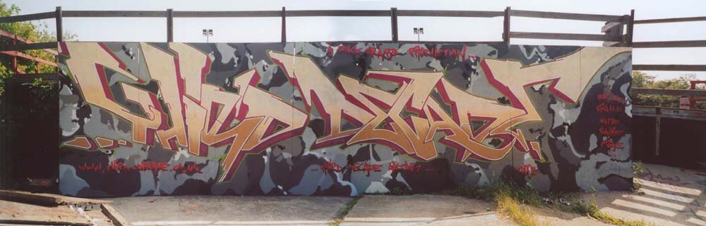 an image of graffiti writing on a wall