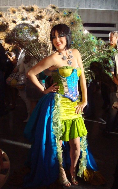 a woman is wearing a costume and is posing for a po