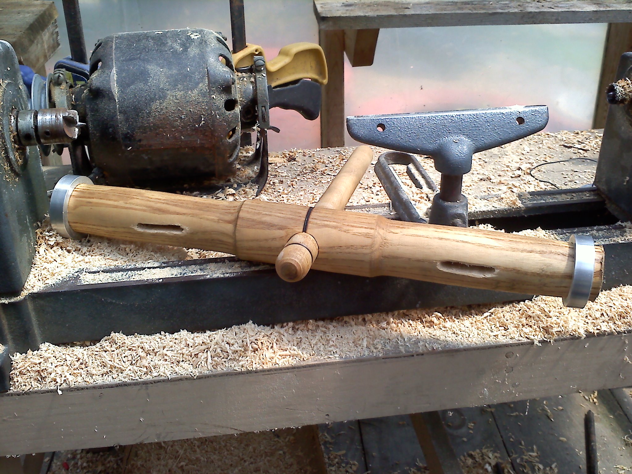 some tools are sitting on top of the wooden board