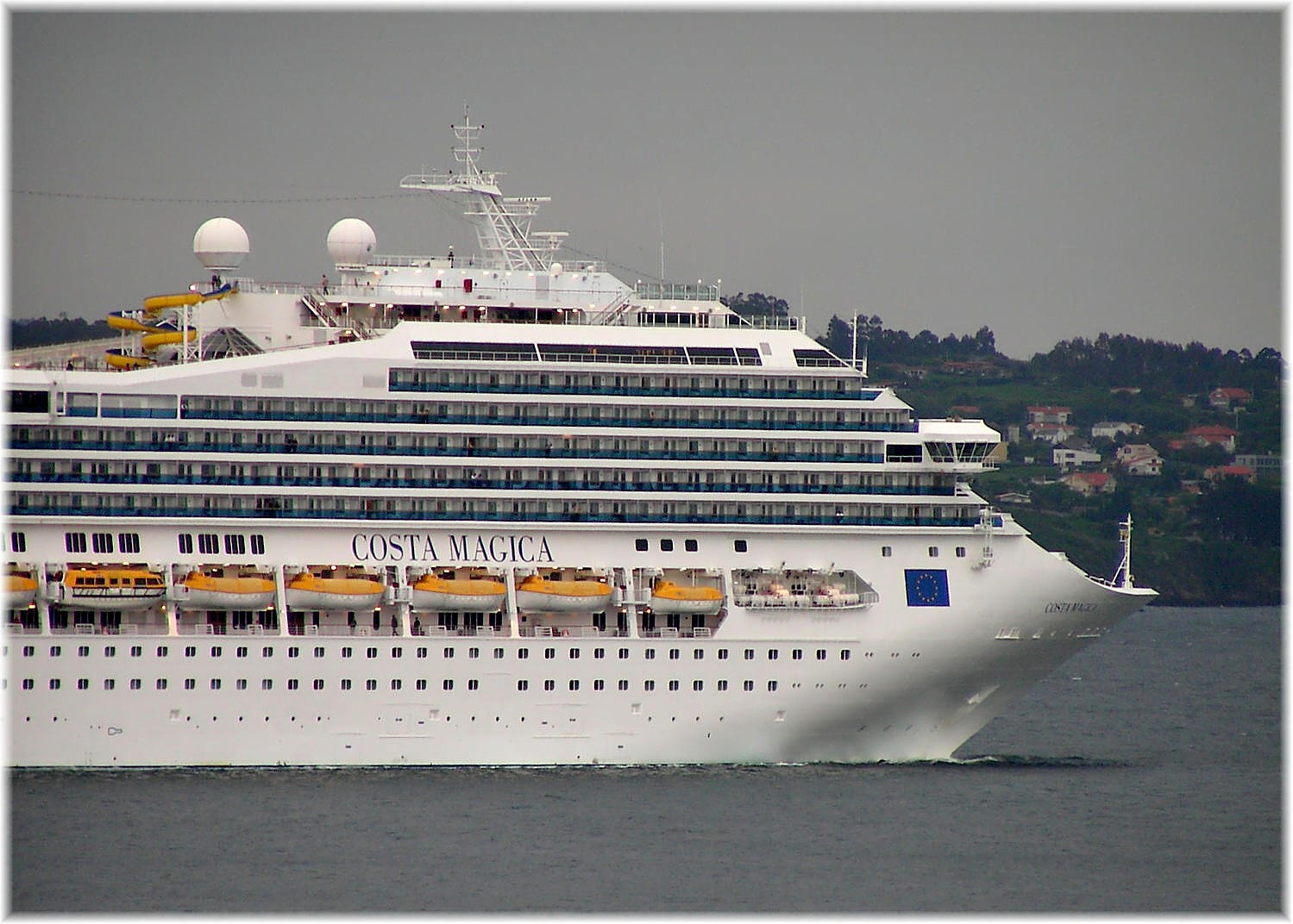 a cruise ship on the water in the open