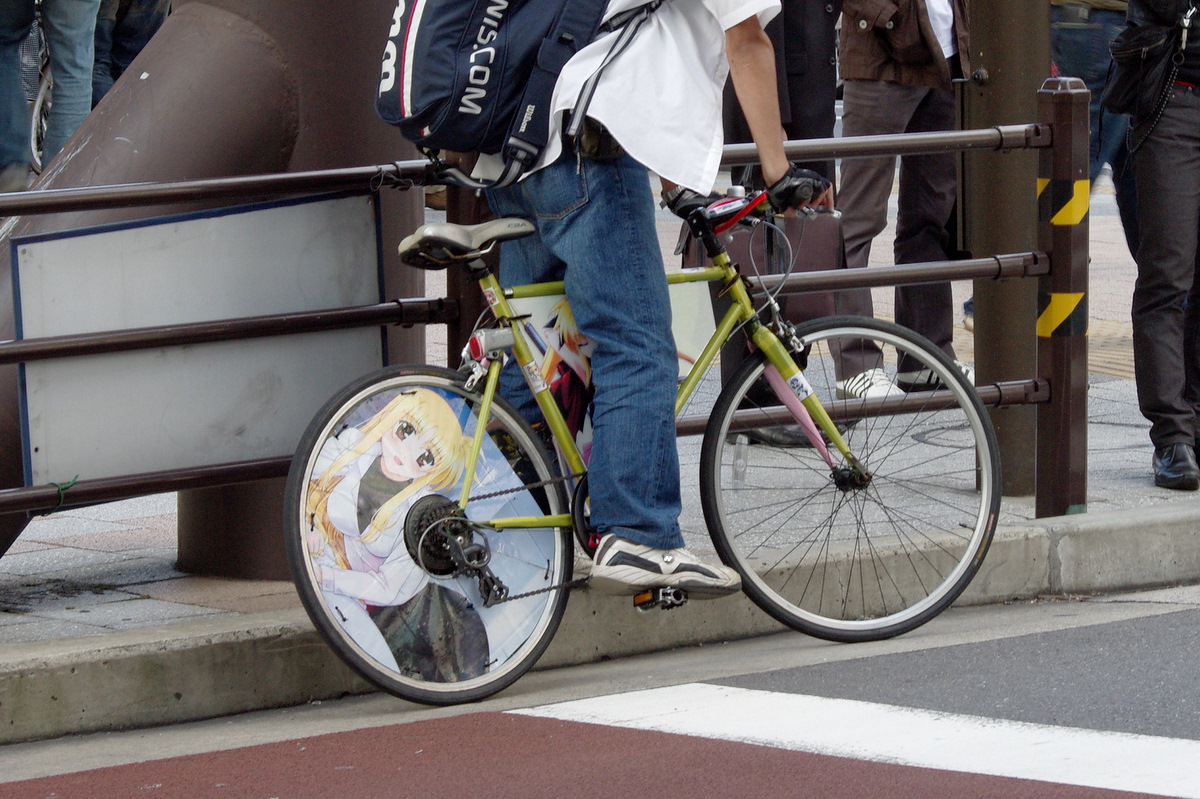 a person with a backpack is on his bike