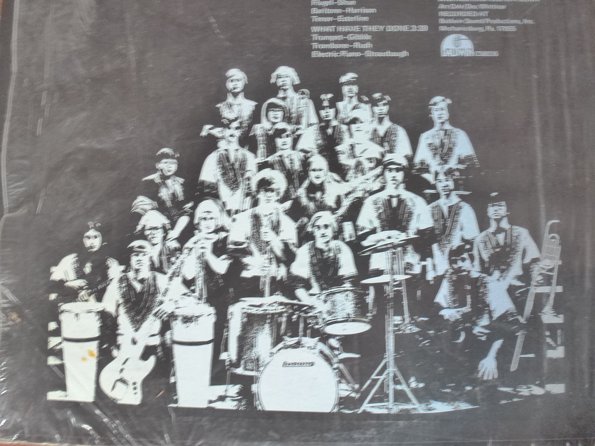 an old album showing band and drummers