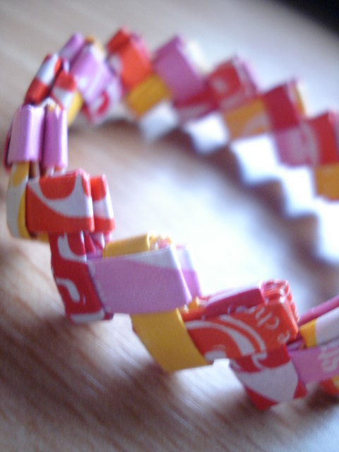a close up image of a celet made from toy blocks