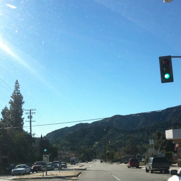 this is an image of a street going into a small town