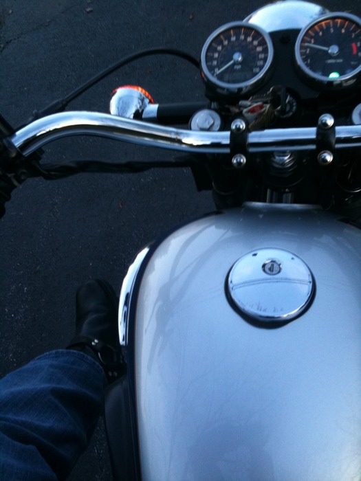 a close up of a person on a motorcycle