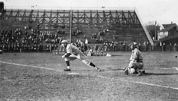 old pograph of baseball batter swinging at ball during game