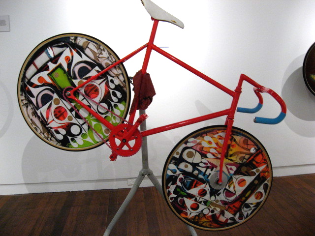 the bicycle is designed from brightly colored parts