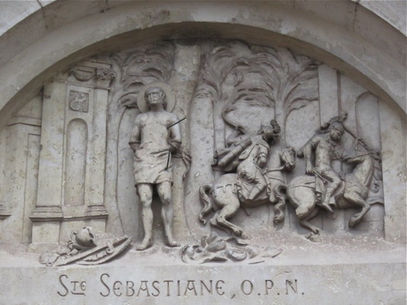 this is an old bas relief depicting several people