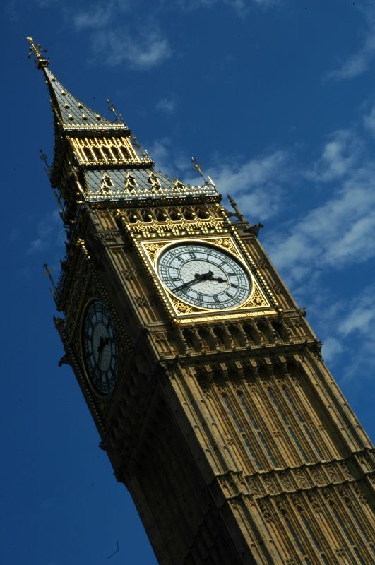 a clock tower that is near the water