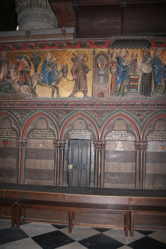 the painting above is depicting religious scenes and features in the interior