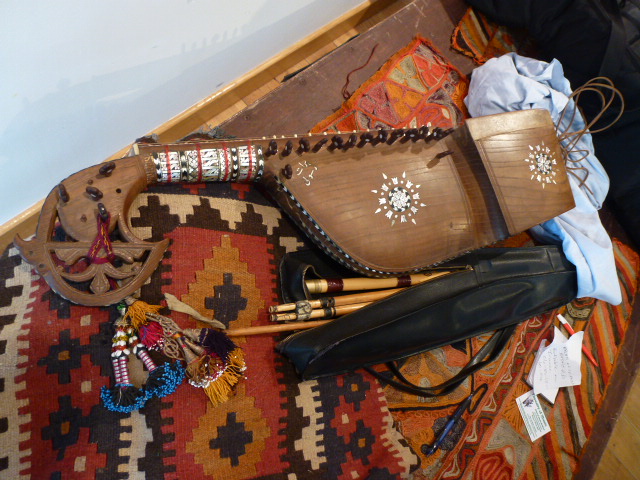 an assortment of items on a wooden table top