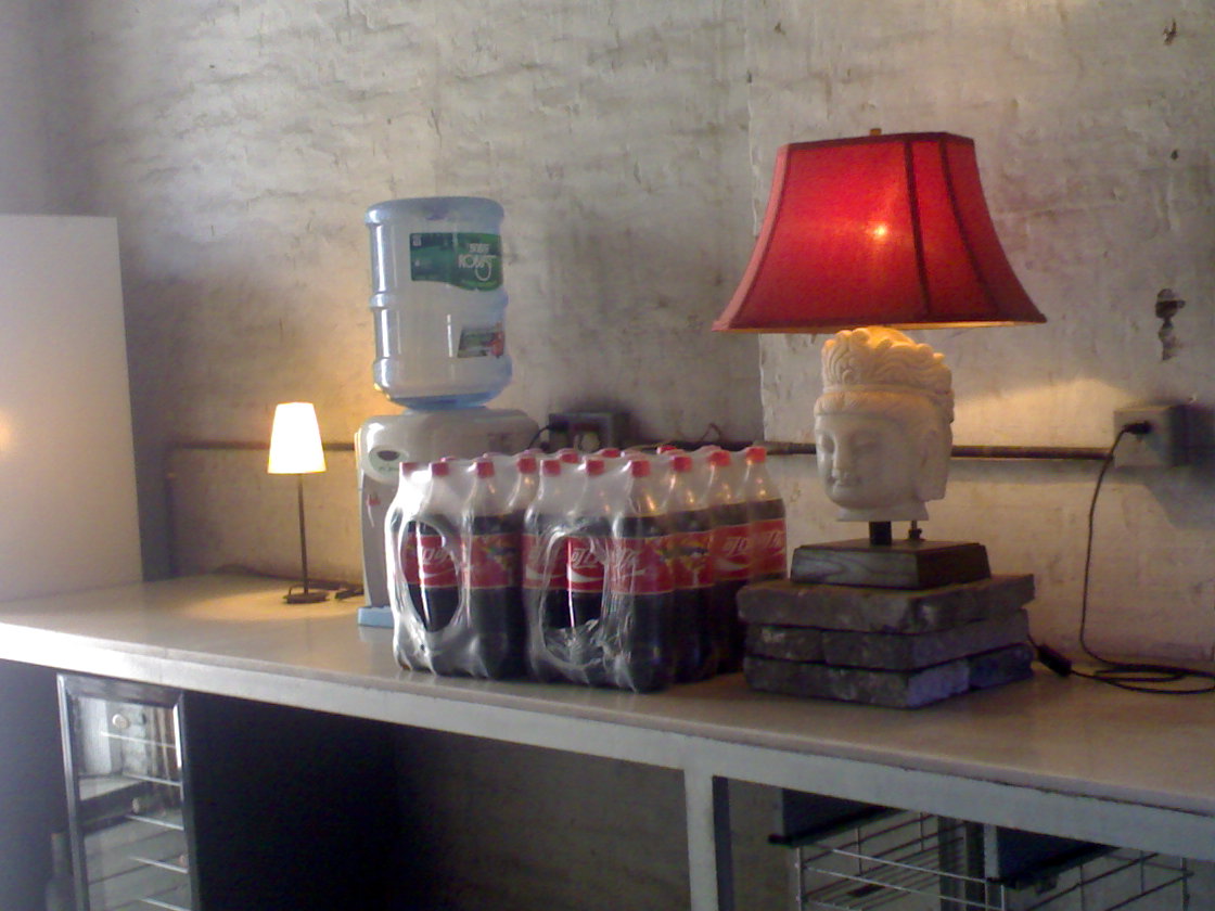 a table with boxes, a head lamp, and a red light