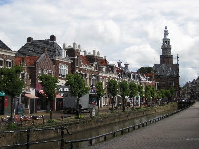 a body of water in front of buildings