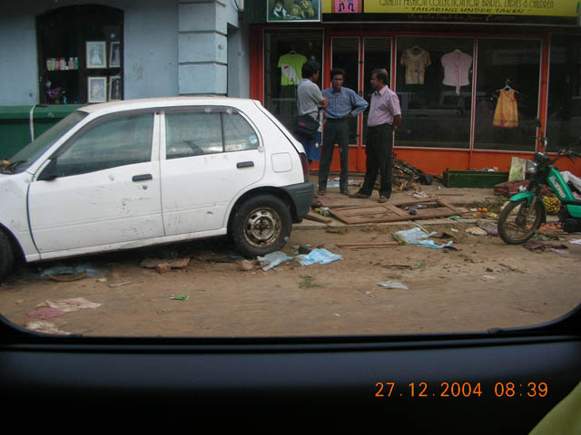 a car that has been destroyed with no doors