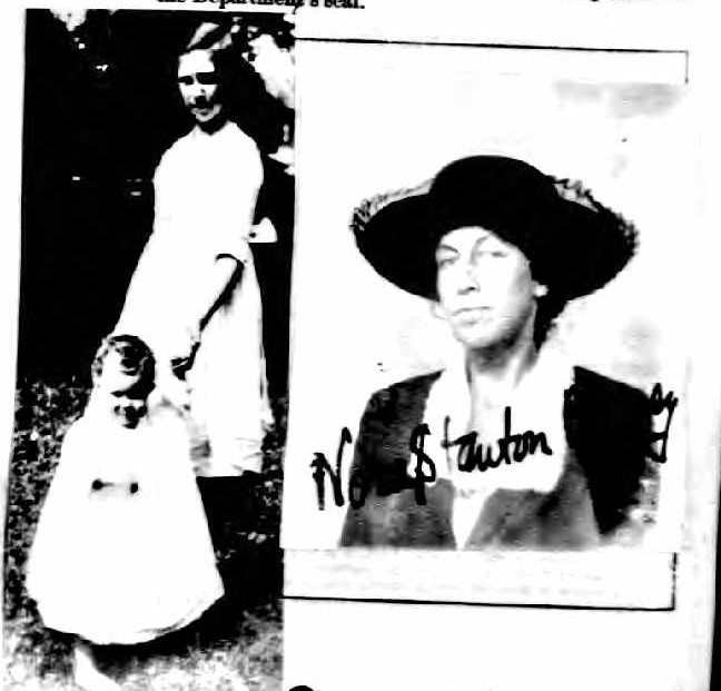 an old black and white po of an old woman in a big hat
