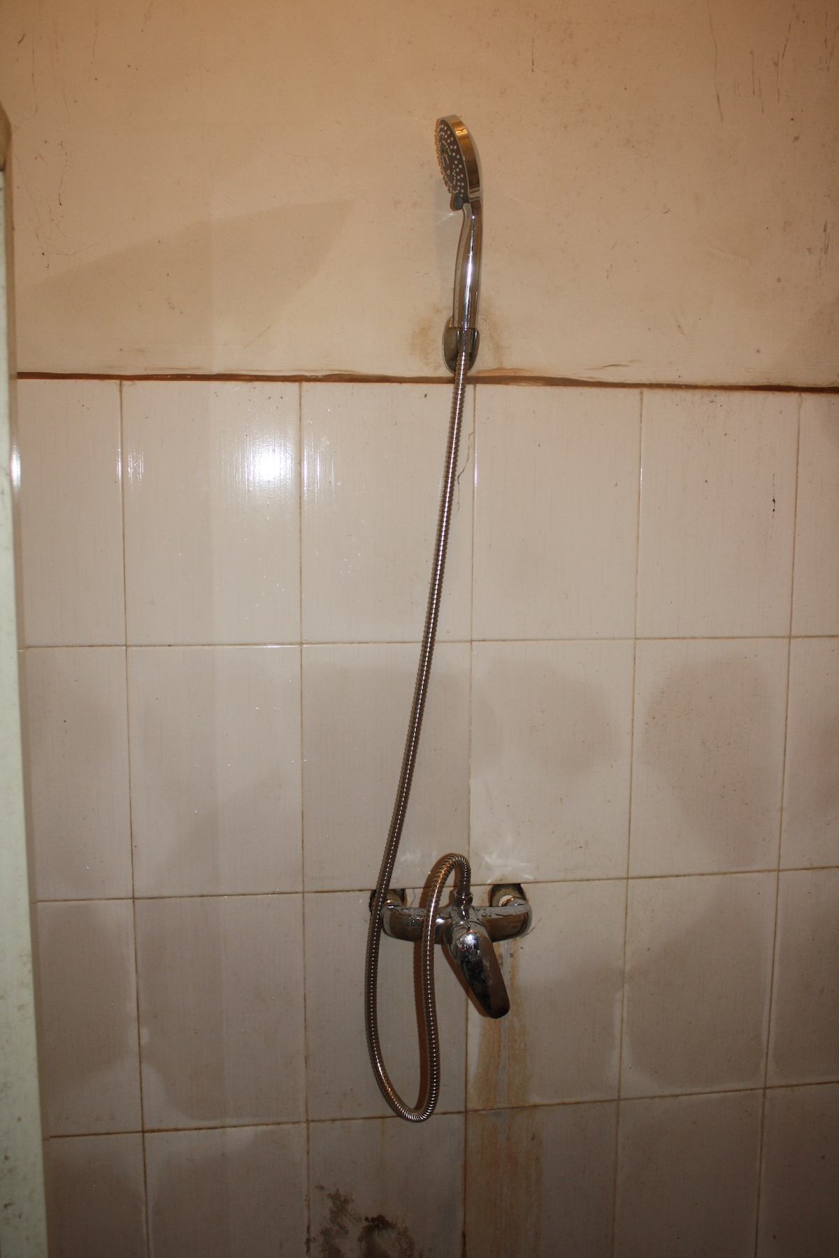 this is an image of a shower with the hose out