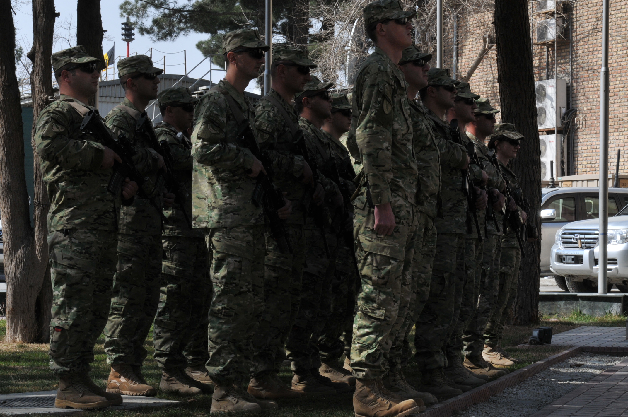 a large group of army men standing together