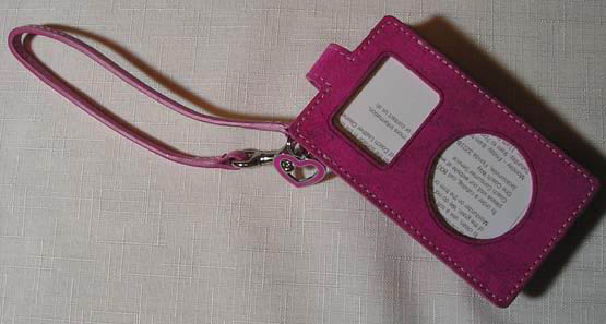 a wallet purse with a pink leather exterior