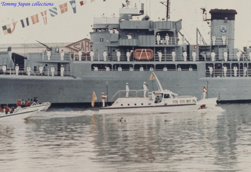 people walking near a large boat in water