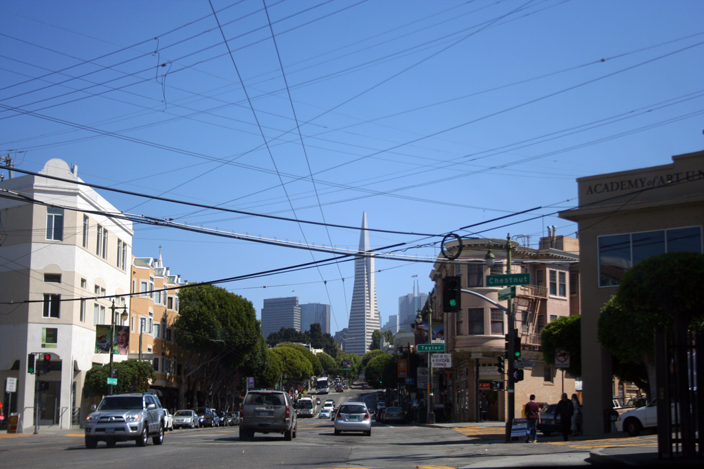 a city street has a stop light on both sides