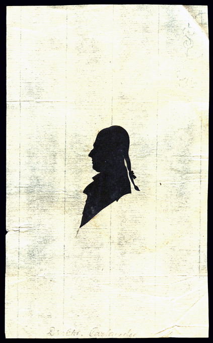 the silhouette of a man's head against the side of a piece of paper