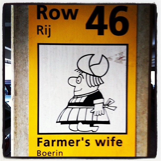 a sign depicting the name of farmer's wife