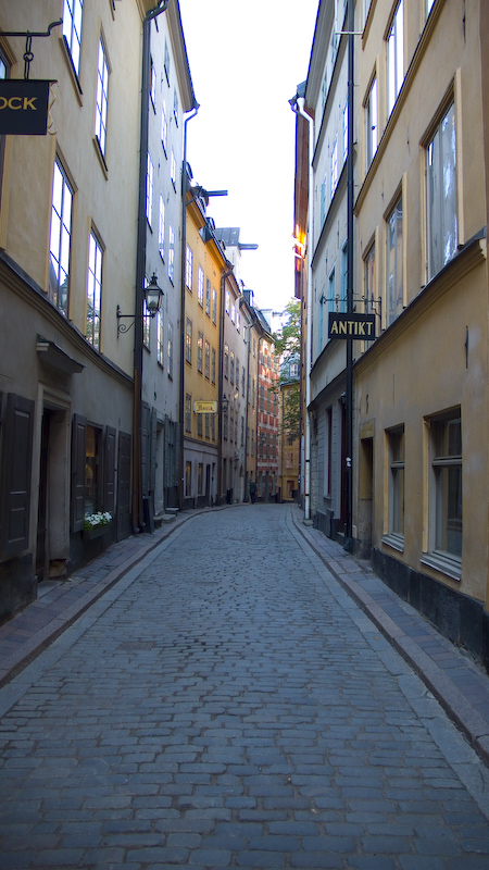 the stone streets of the old town have a cobble stone walkway